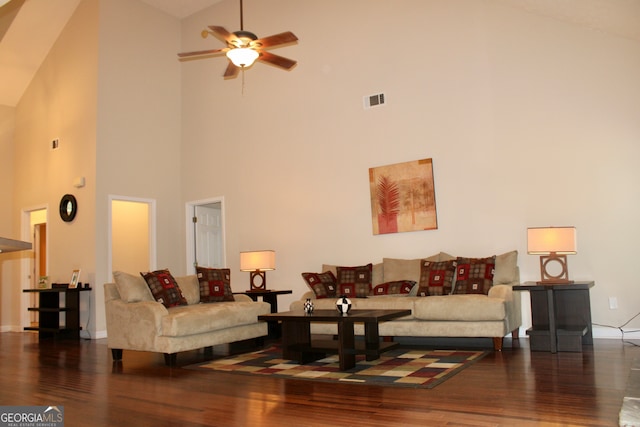 living room with high vaulted ceiling, ceiling fan, and dark hardwood / wood-style floors