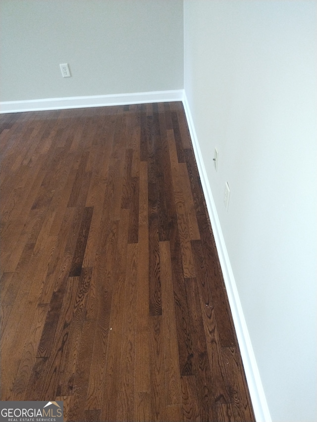 interior details featuring hardwood / wood-style floors