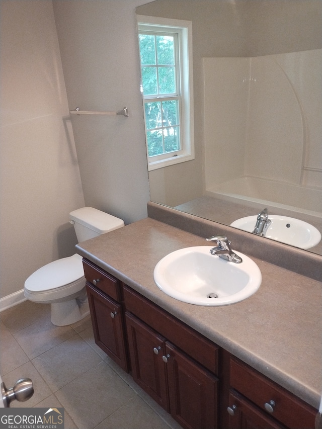 full bathroom with tile patterned flooring, vanity, toilet, and plus walk in shower