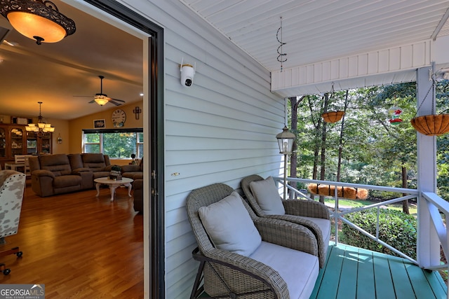 deck with ceiling fan and an outdoor hangout area