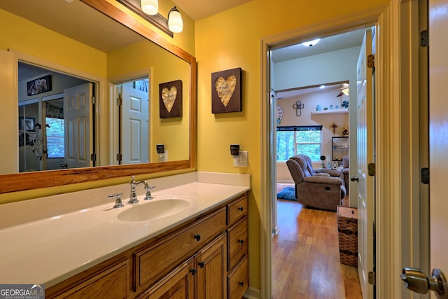 bathroom featuring vanity and hardwood / wood-style flooring