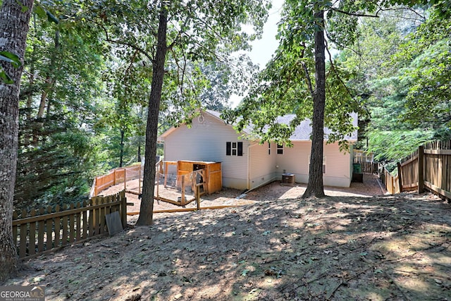 exterior space with cooling unit and a patio