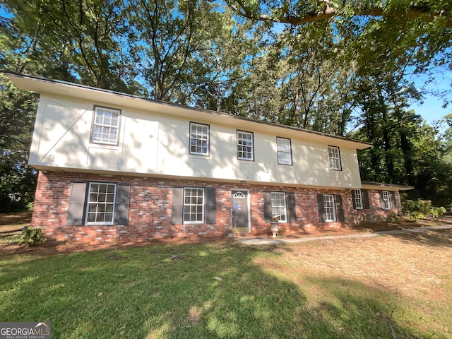 view of front facade featuring a front yard