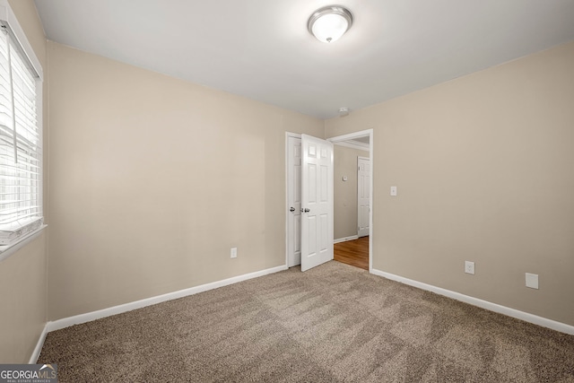 view of carpeted spare room