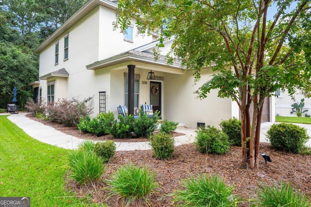 view of front of property featuring covered porch