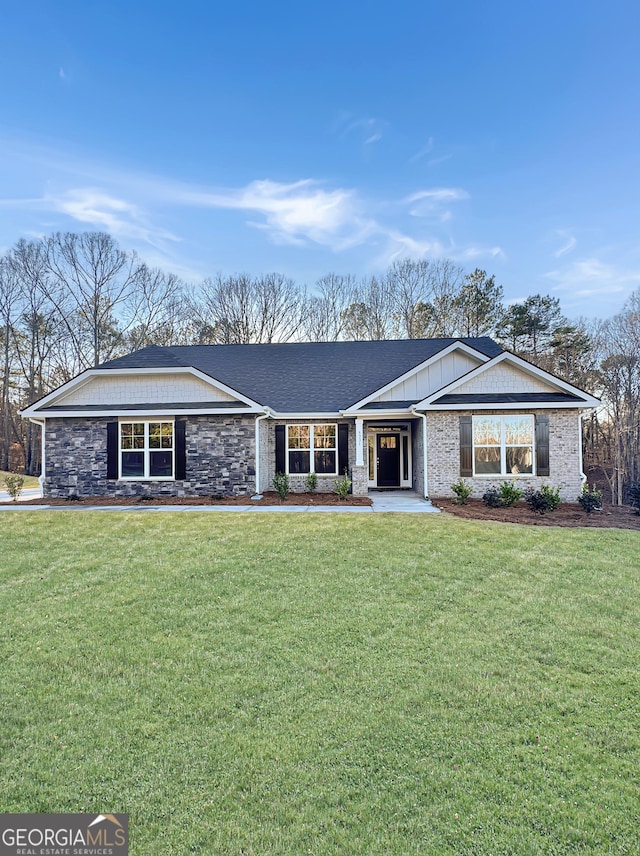 ranch-style house with a front lawn