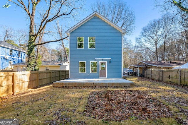 back of property featuring a patio area