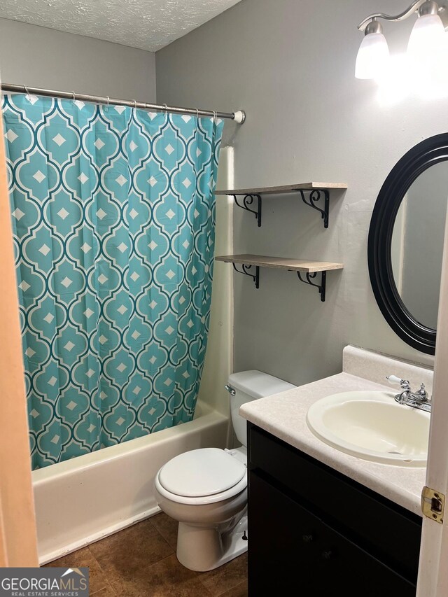 full bathroom featuring a textured ceiling, vanity, toilet, and shower / bath combo