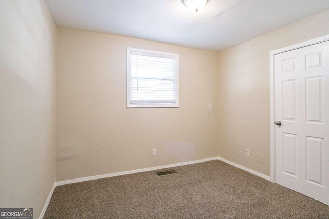 view of carpeted spare room