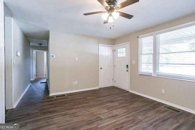 foyer featuring ceiling fan and dark hardwood / wood-style flooring