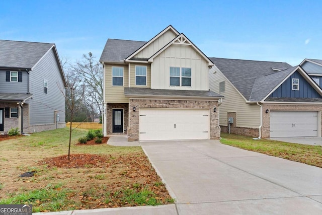 craftsman-style home with a garage and a front lawn