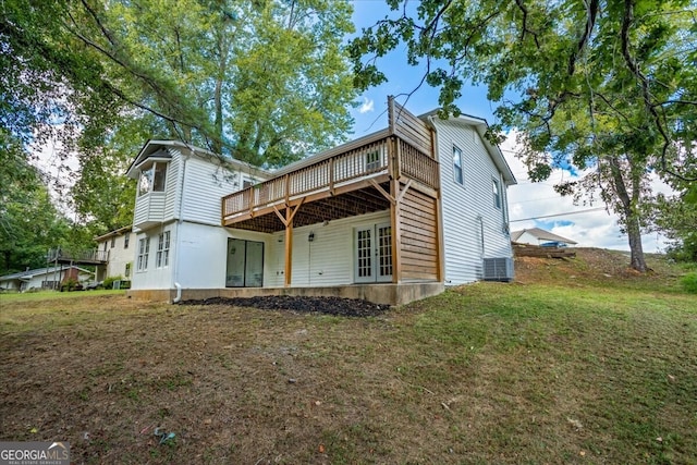 exterior space featuring a yard, french doors, and a deck