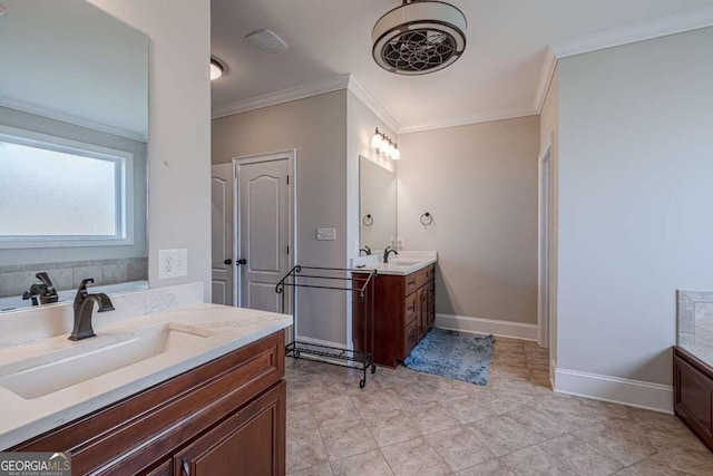 bathroom featuring crown molding and vanity