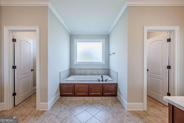 bathroom featuring a bathtub, vanity, and ornamental molding