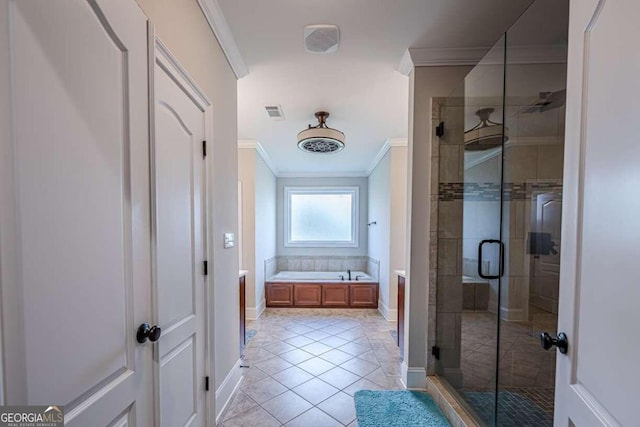 bathroom featuring crown molding, plus walk in shower, and tile patterned floors