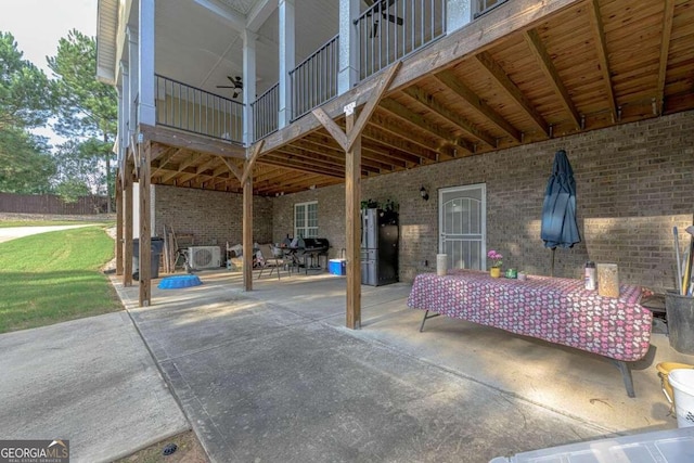 view of patio with a balcony