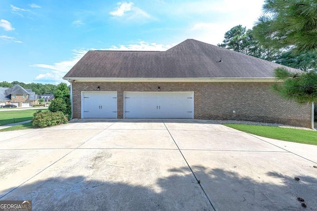 view of home's exterior with a garage