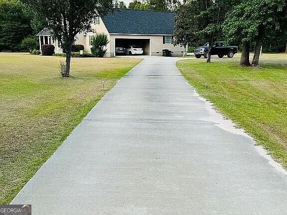 exterior space featuring a lawn