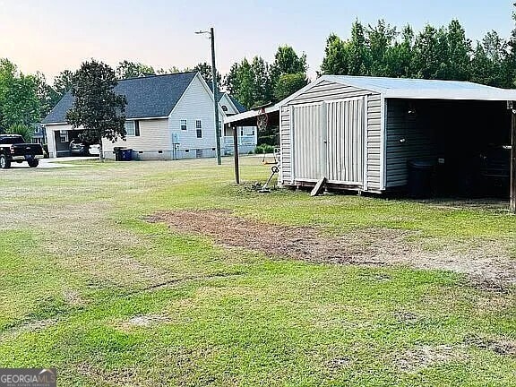 exterior space featuring a shed