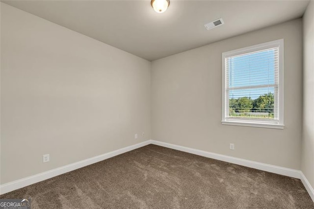 view of carpeted spare room