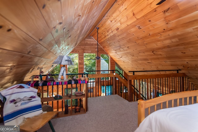 carpeted bedroom featuring wooden ceiling, vaulted ceiling, and wood walls