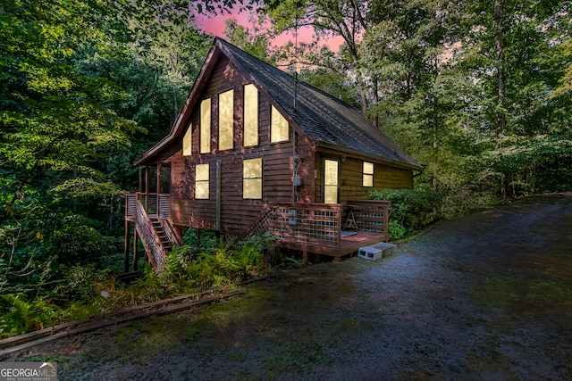 view of property exterior at dusk