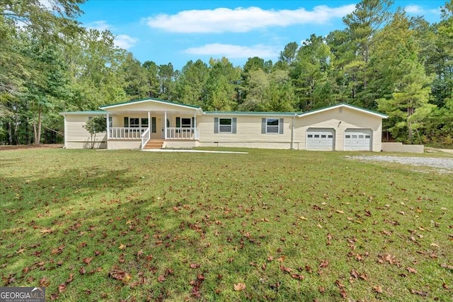 ranch-style home featuring a front yard and covered porch