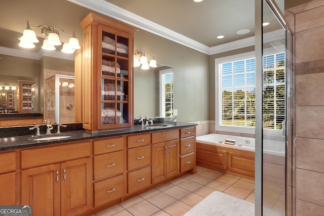 bathroom featuring crown molding, vanity, separate shower and tub, and tile patterned flooring