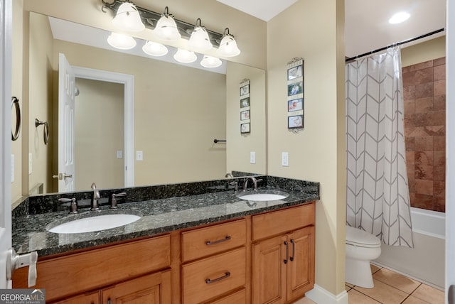 full bathroom with vanity, toilet, shower / tub combo, and tile patterned floors