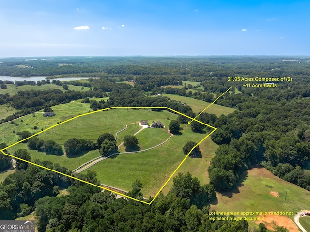 aerial view with a water view and a rural view