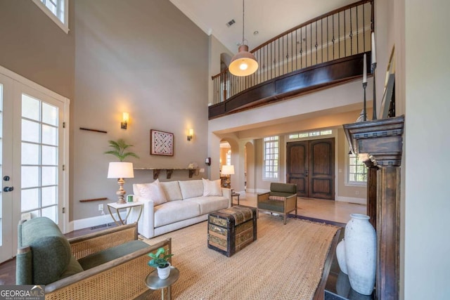 living room with a high ceiling