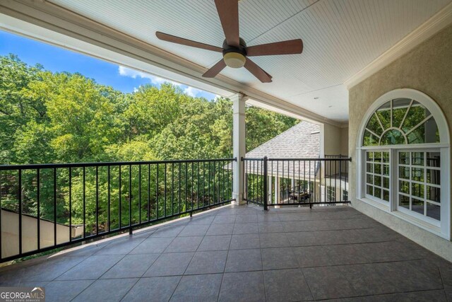 view of patio / terrace featuring a balcony and ceiling fan