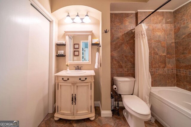 full bathroom with vanity, toilet, and shower / bathtub combination with curtain