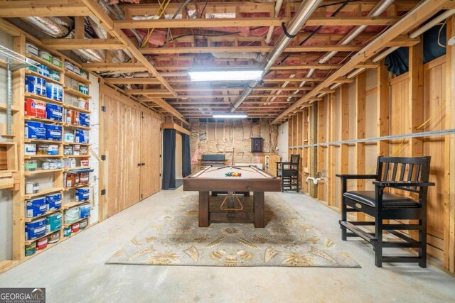 playroom featuring pool table and concrete flooring