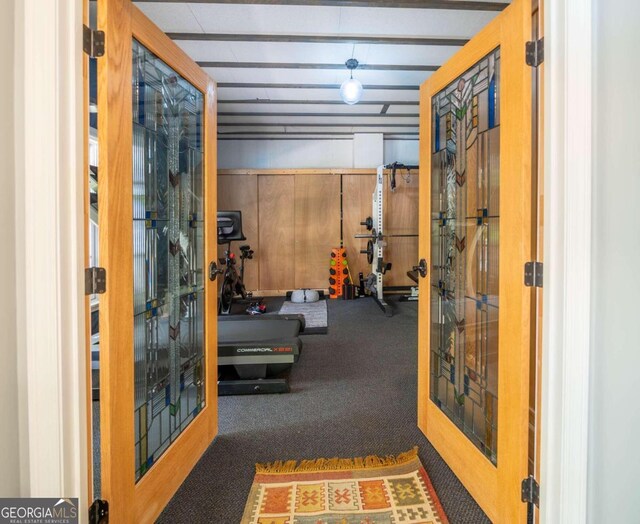 exercise room featuring carpet floors