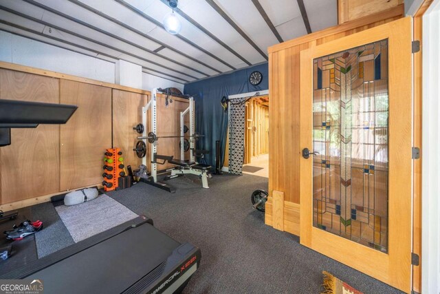 workout room featuring carpet floors