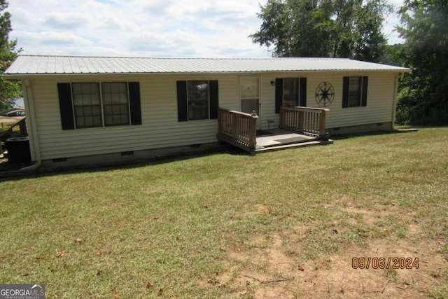 ranch-style home with a front yard