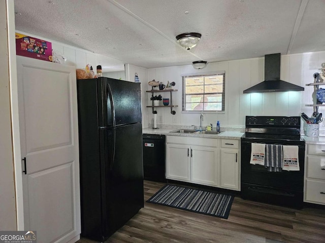 kitchen with sink, wall chimney range hood, black appliances, dark hardwood / wood-style floors, and a textured ceiling