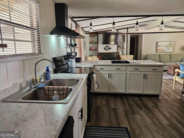 kitchen with white cabinets, dark hardwood / wood-style flooring, wall chimney exhaust hood, and stainless steel electric range