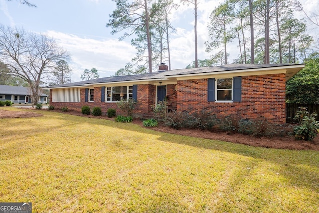 ranch-style house with a front yard