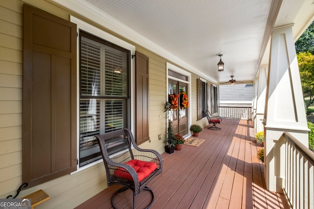 wooden deck featuring covered porch