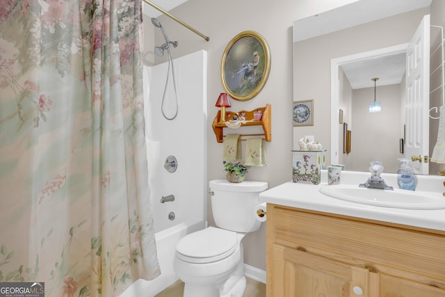 full bathroom featuring vanity, toilet, and shower / bath combo with shower curtain