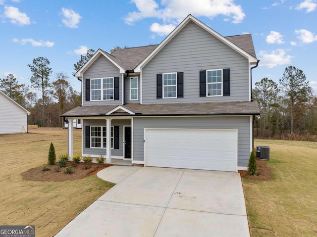 32 Joseph Ln, Hartwell, GA 30643 - traditional-style house featuring a garage, covered porch, driveway, and a front lawn