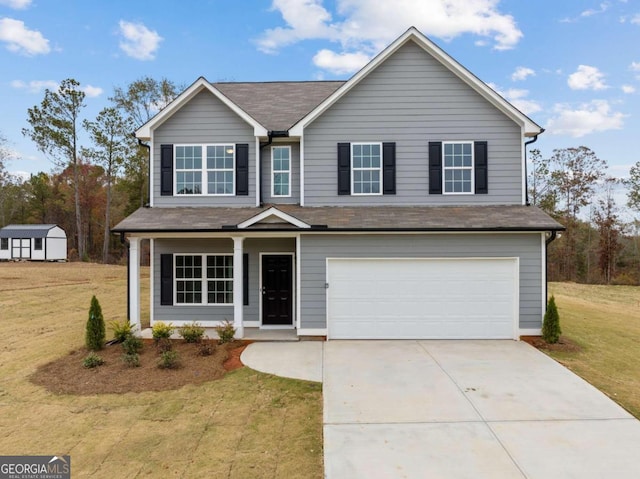 32 Joseph Ln, Hartwell, GA 30643 - traditional-style house with an attached garage, a front yard, driveway, and a porch