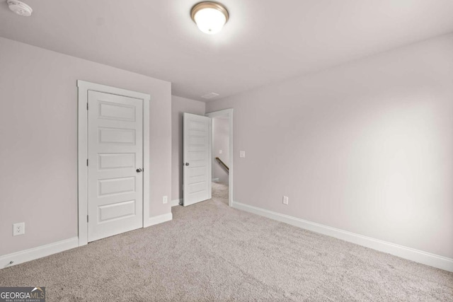 32 Joseph Ln, Hartwell, GA 30643 - unfurnished bedroom with carpet floors and baseboards
