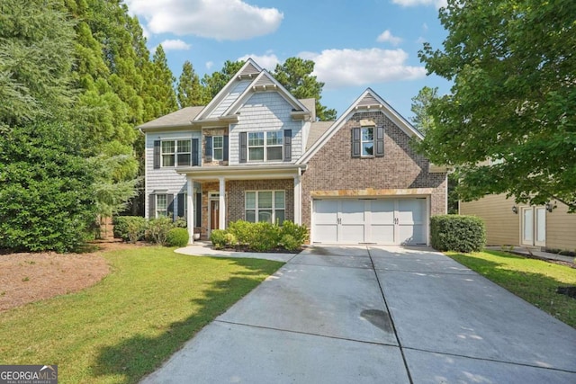 view of front of home with a garage and a front lawn