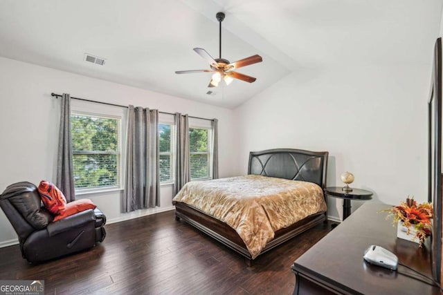 bedroom with dark wood-type flooring, lofted ceiling, and ceiling fan