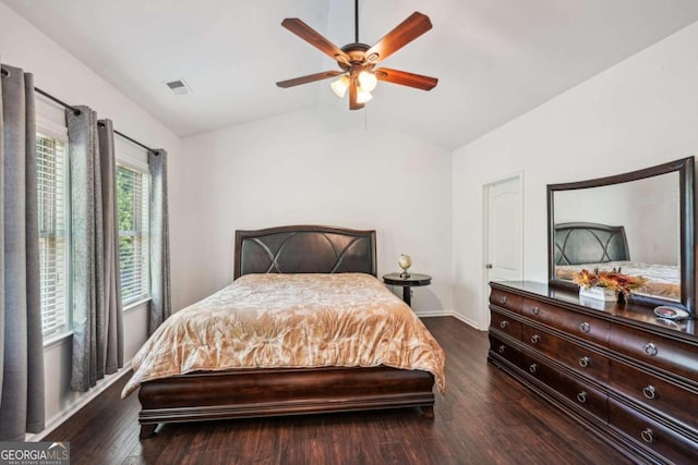 bedroom with lofted ceiling, ceiling fan, and dark hardwood / wood-style floors