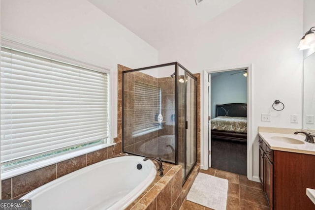 bathroom with vanity, separate shower and tub, and tile patterned flooring