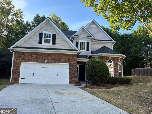 view of front of house with a garage